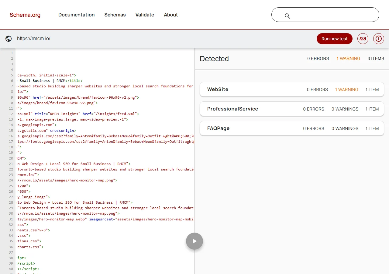 Schema.org validator results for rmcm.io showing zero errors, one warning on the WebSite block, and clean ProfessionalService and FAQPage blocks